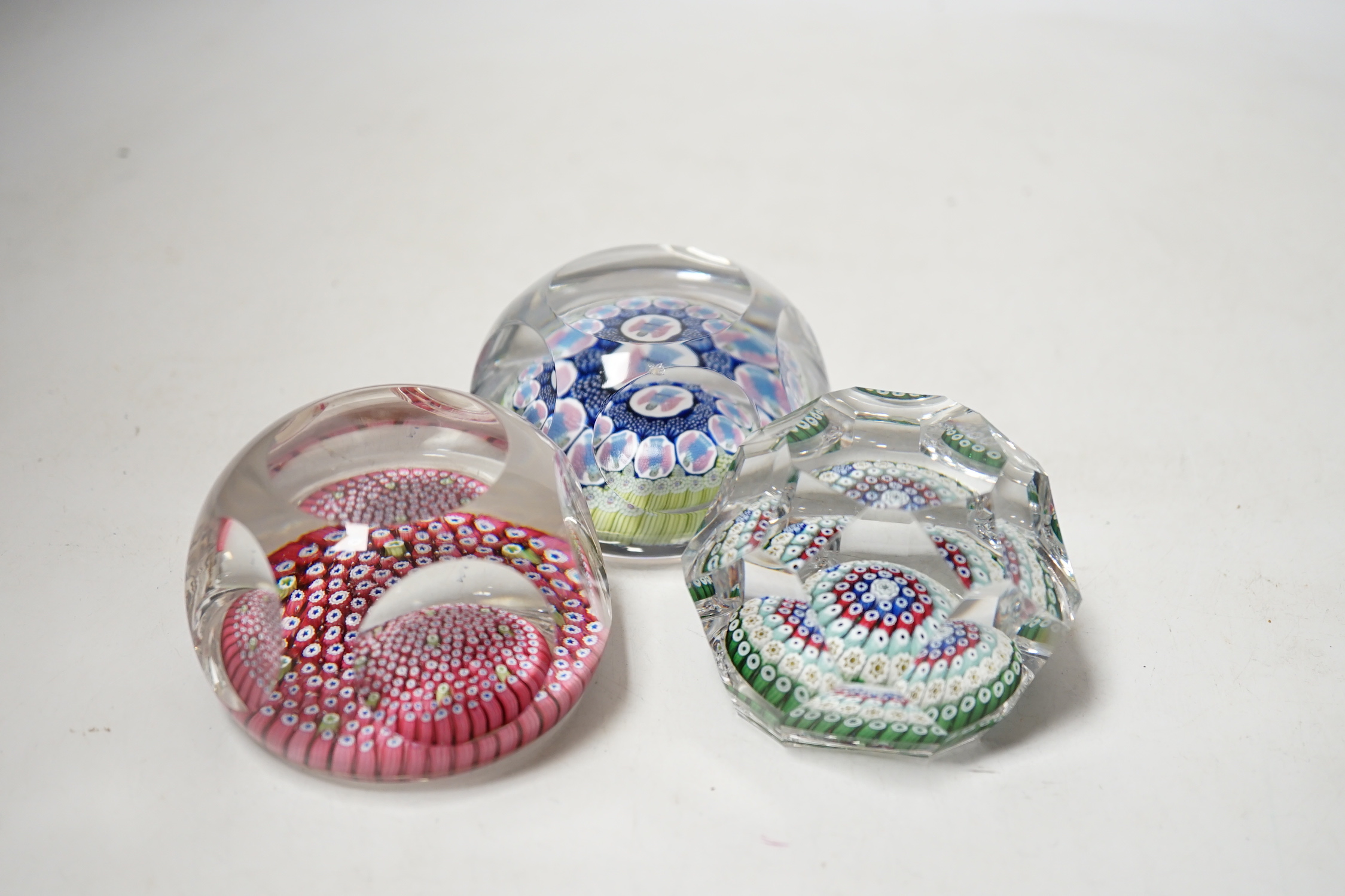 Three Whitefriars faceted millefiori glass paperweights, 8cm in diameter
